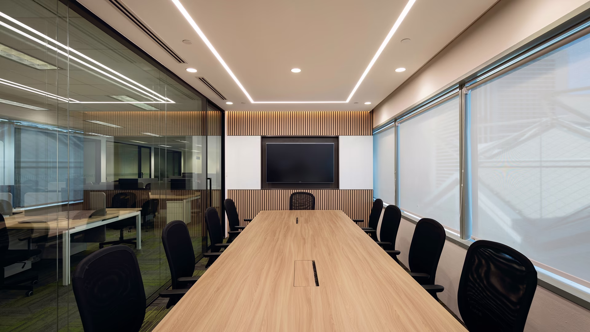 A dedicated meeting room provides a structured setting for team discussions, presentations and collaborative work.