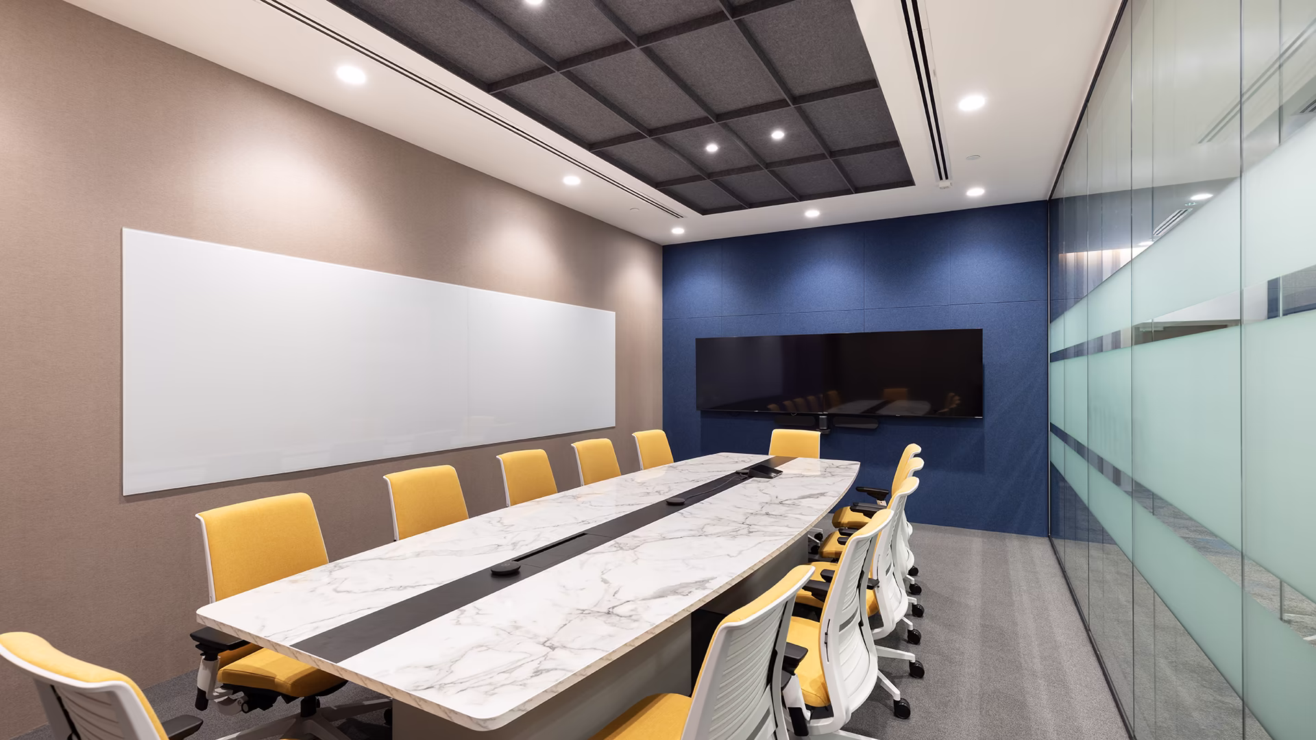 Integrated meeting technology supports presentations, discussions and hybrid collaboration within the space.